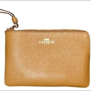 Tan Coach wristlet